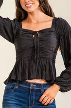 The Midnight Peplum Top